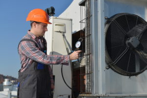 man working on airconditioner